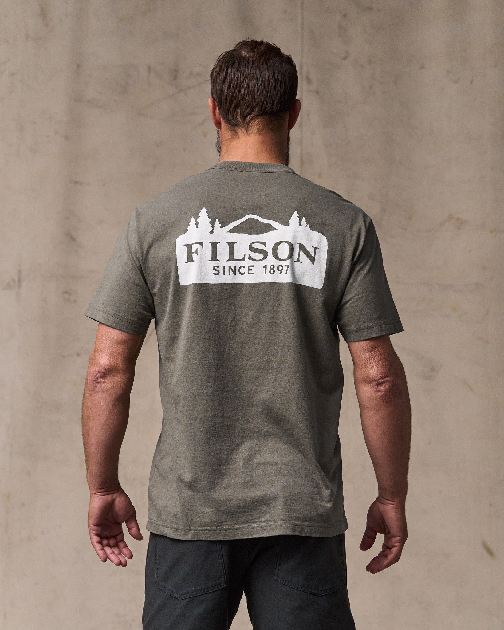 image of a model wearing Filson's Scenic Graphic T-shirt - Hawk Brown