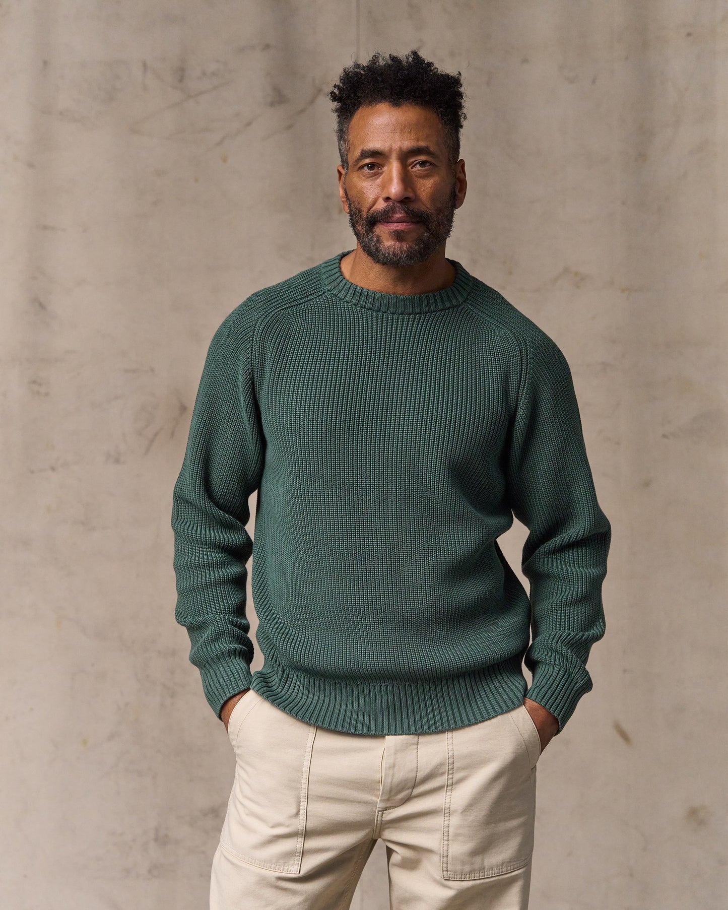 image of a model wearing Filson's Vintage Cotton Crewneck Sweater - Juniper|Model is 6'2" wearing a size medium