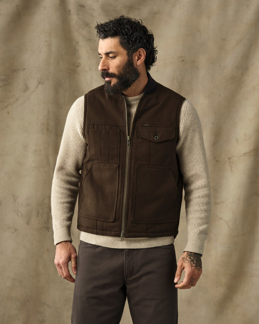 image of a model wearing Filson's Spokane Insulated Work Vest - Beaver Brown