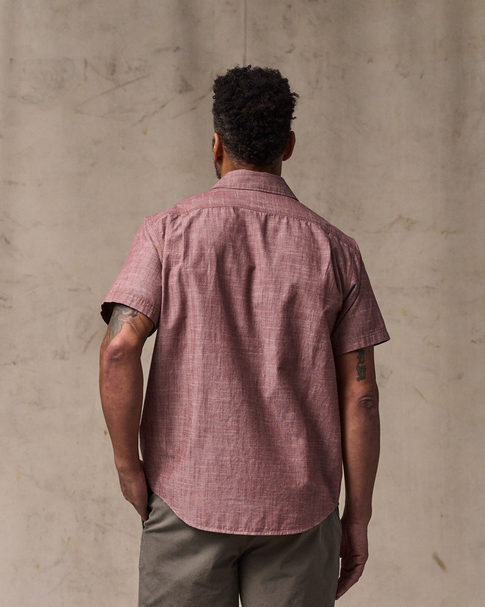 image of a model wearing Filson's Short Sleeve Chambray Shirt  - Sable