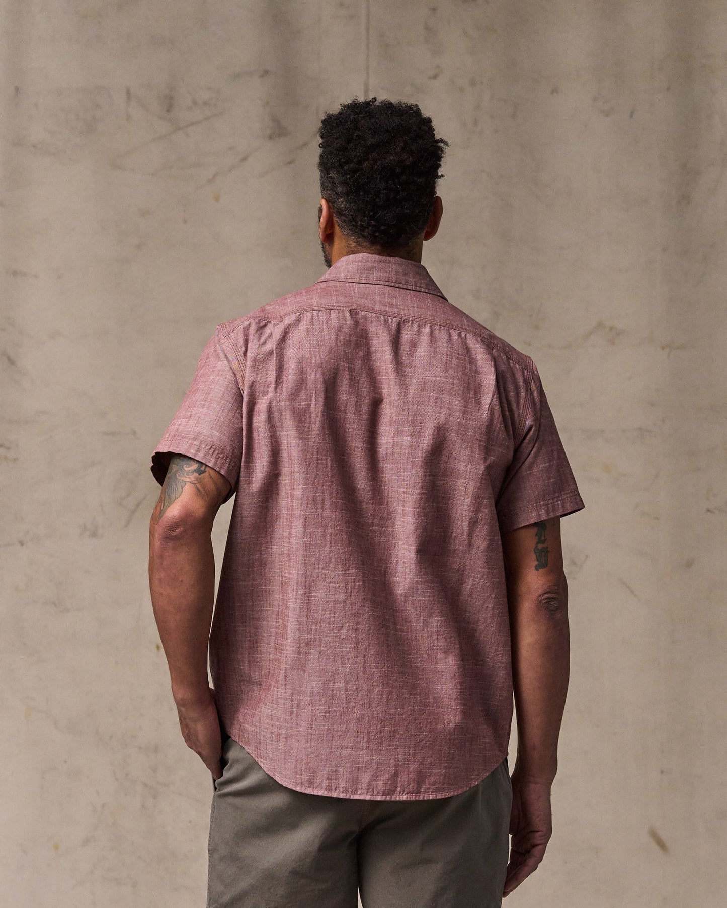 image of a model wearing Filson's Short Sleeve Chambray Shirt  - Sable