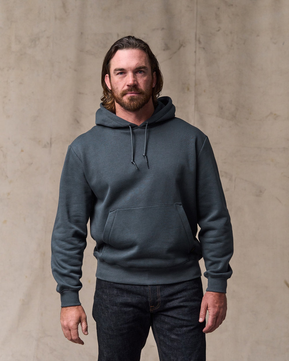 image of a model wearing Filson's Northwest Hoodie - Ink Blue