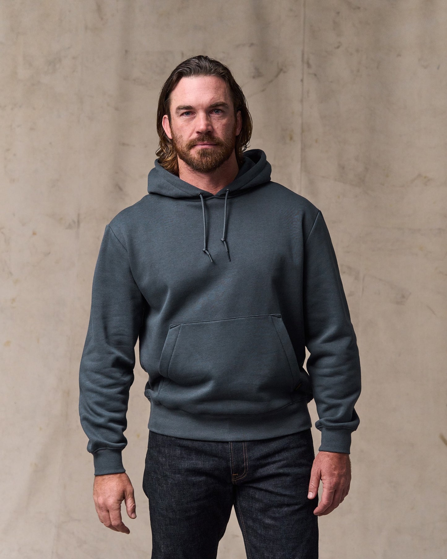image of a model wearing Filson's Northwest Hoodie - Ink Blue|Model is 6'1" wearing a size medium