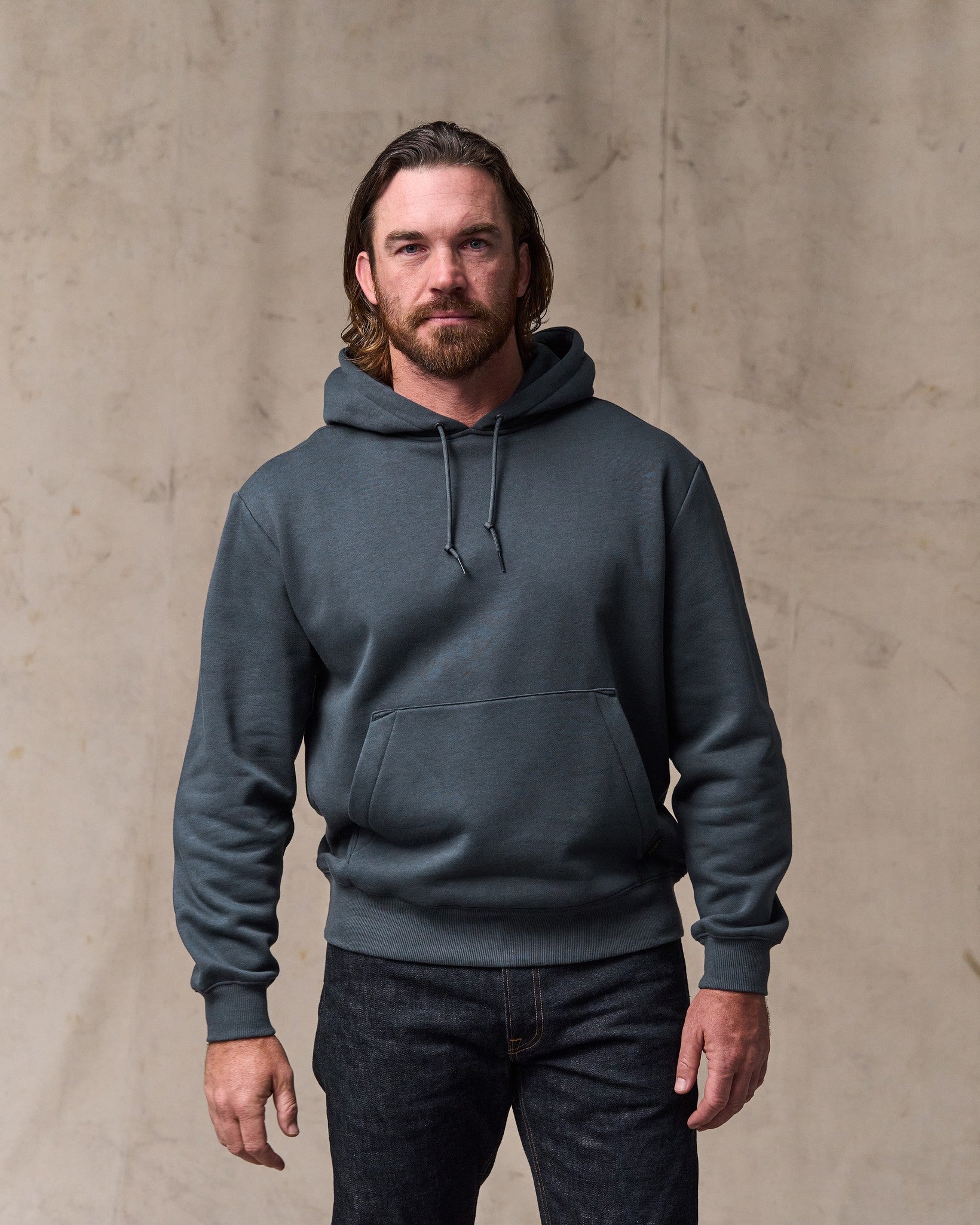 image of a model wearing Filson's Northwest Hoodie - Ink Blue