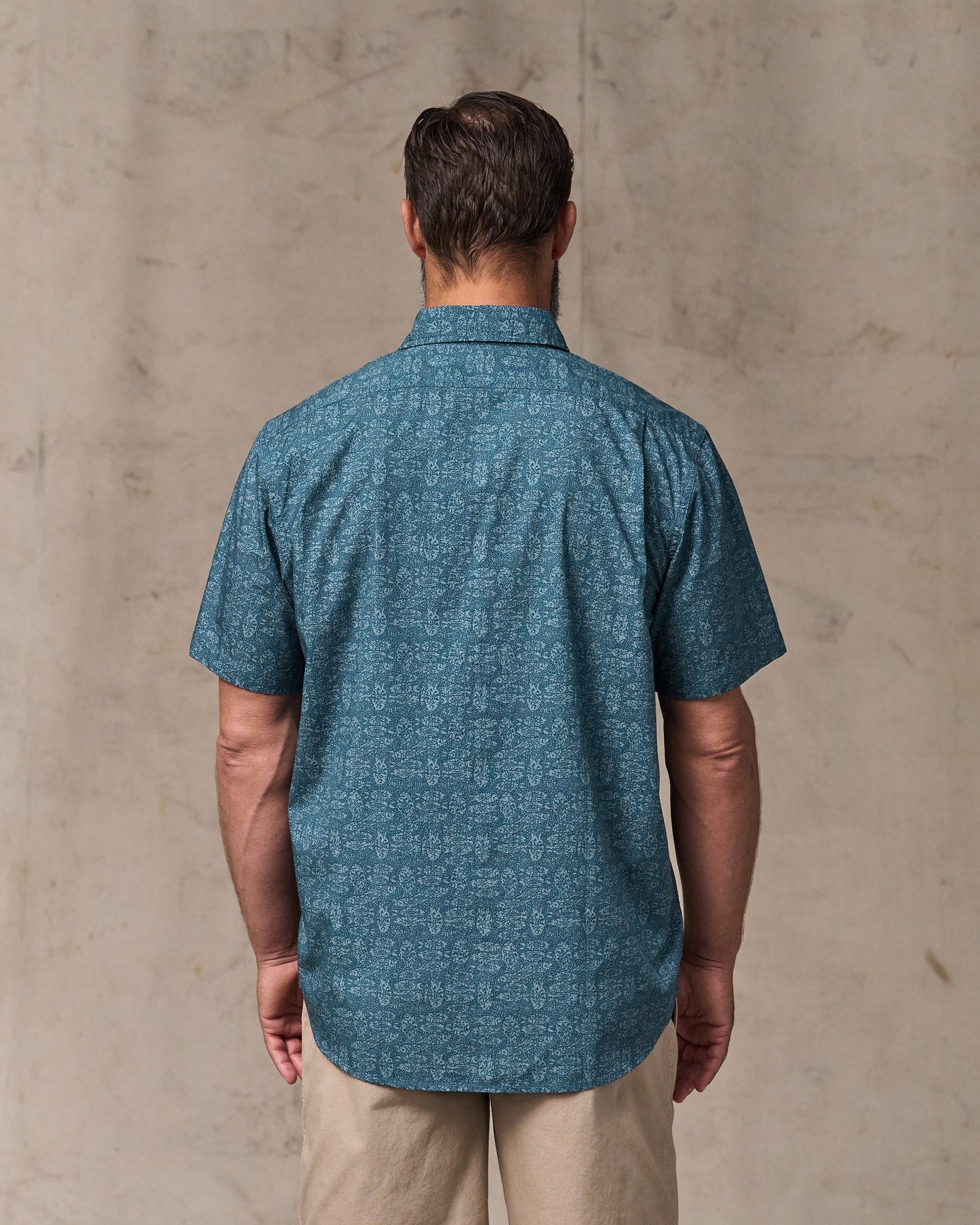 image of a model wearing Filson's Filson's Washed Short Sleeve Feather Cloth Shirt - Blue / Print