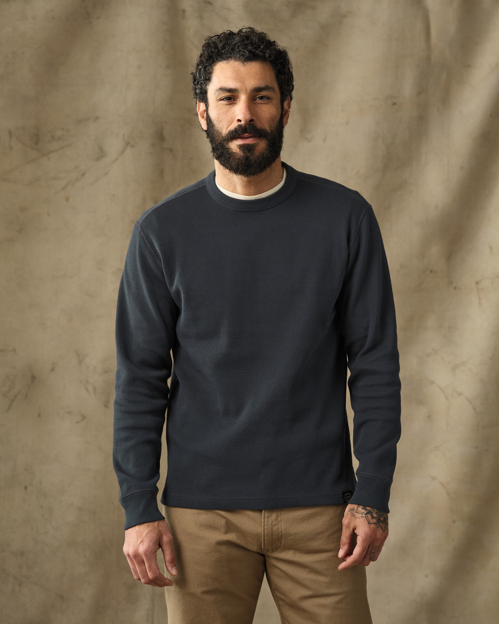 image of a model wearing Filson's Waffle Knit Thermal Crewneck - Blue Mussel