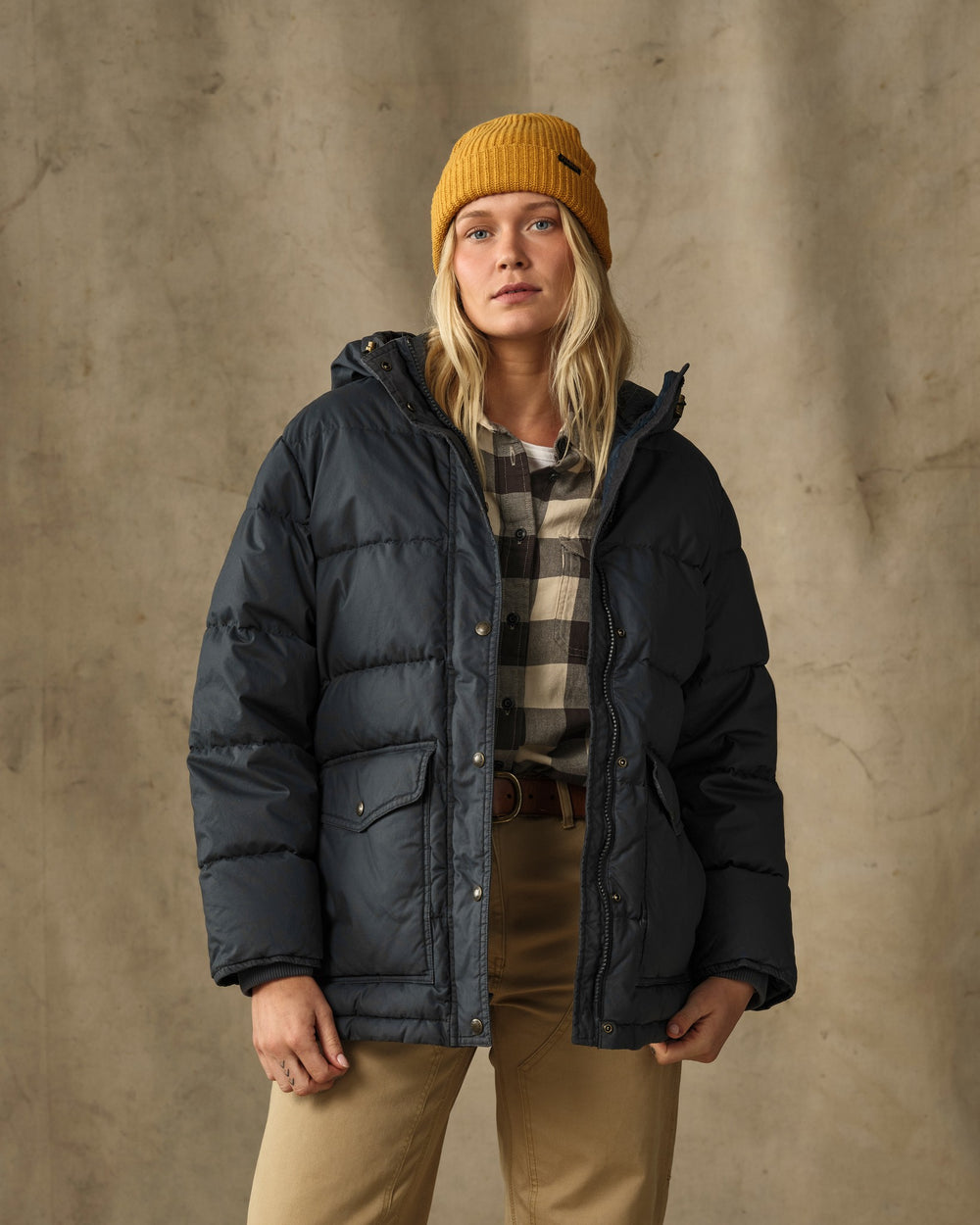 image of a model wearing Filson's Women's Heritage Cotton Down Parka - Bluefin
