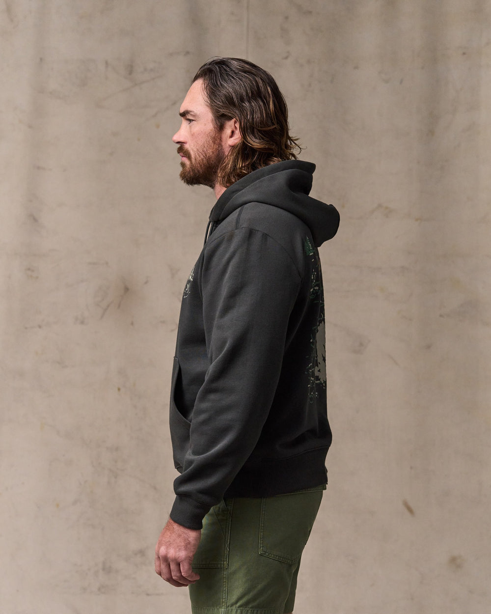 image of a model wearing Filson's Trout Graphic Hoodie - Faded Black