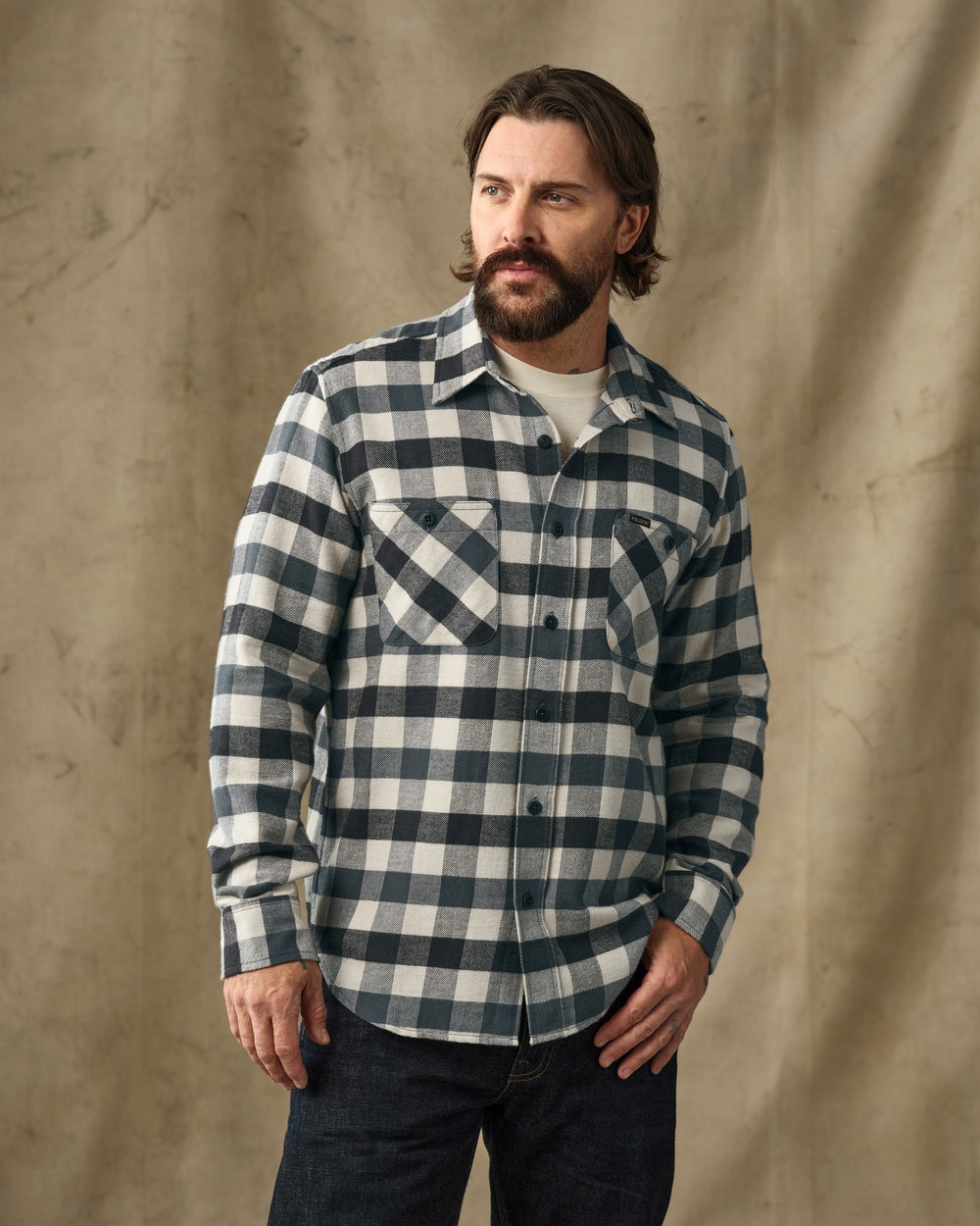 image of a model wearing Filson's Rangeland Flannel Shirt - Charcoal / Steel Plaid