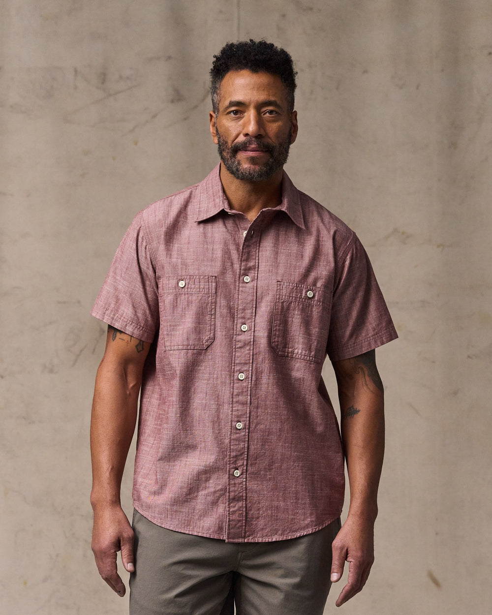 image of a model wearing Filson's Short Sleeve Chambray Shirt  - Sable
