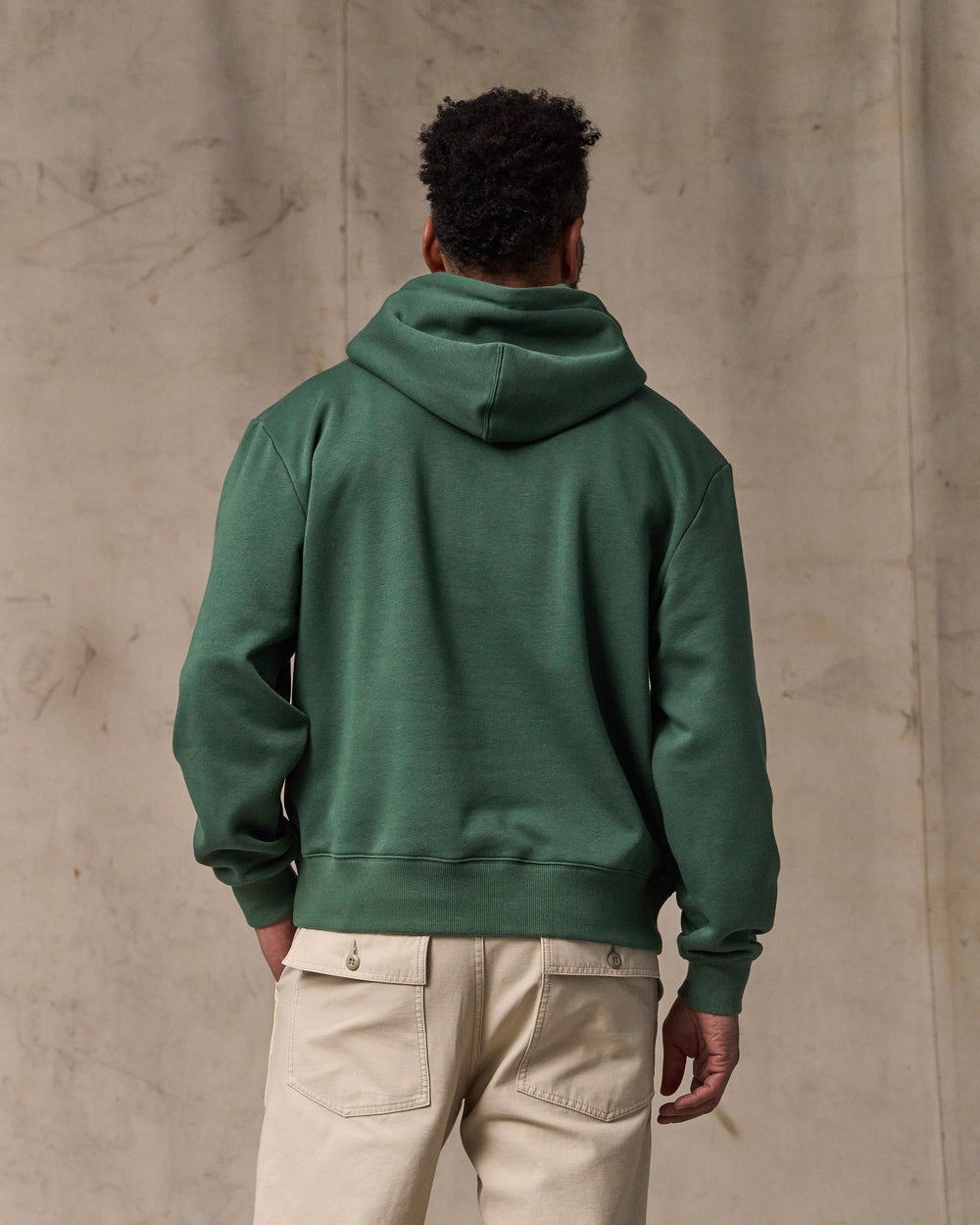 image of a model wearing Filson's Northwest Hoodie - Granite Green
