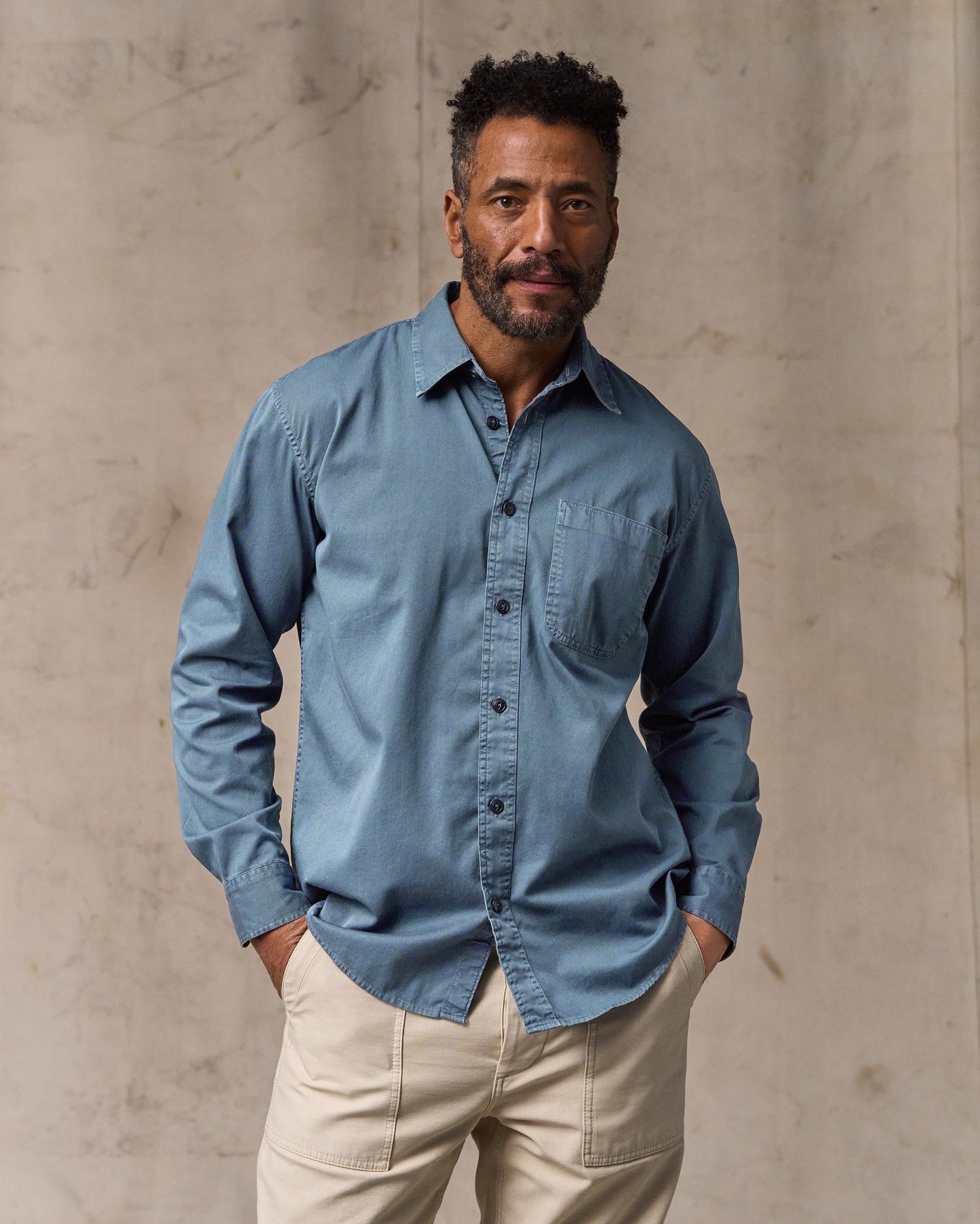 image of a model wearing Filson's 4.5-oz. Twill Shirt - Orion Blue|Model is 6'2" wearing a size medium