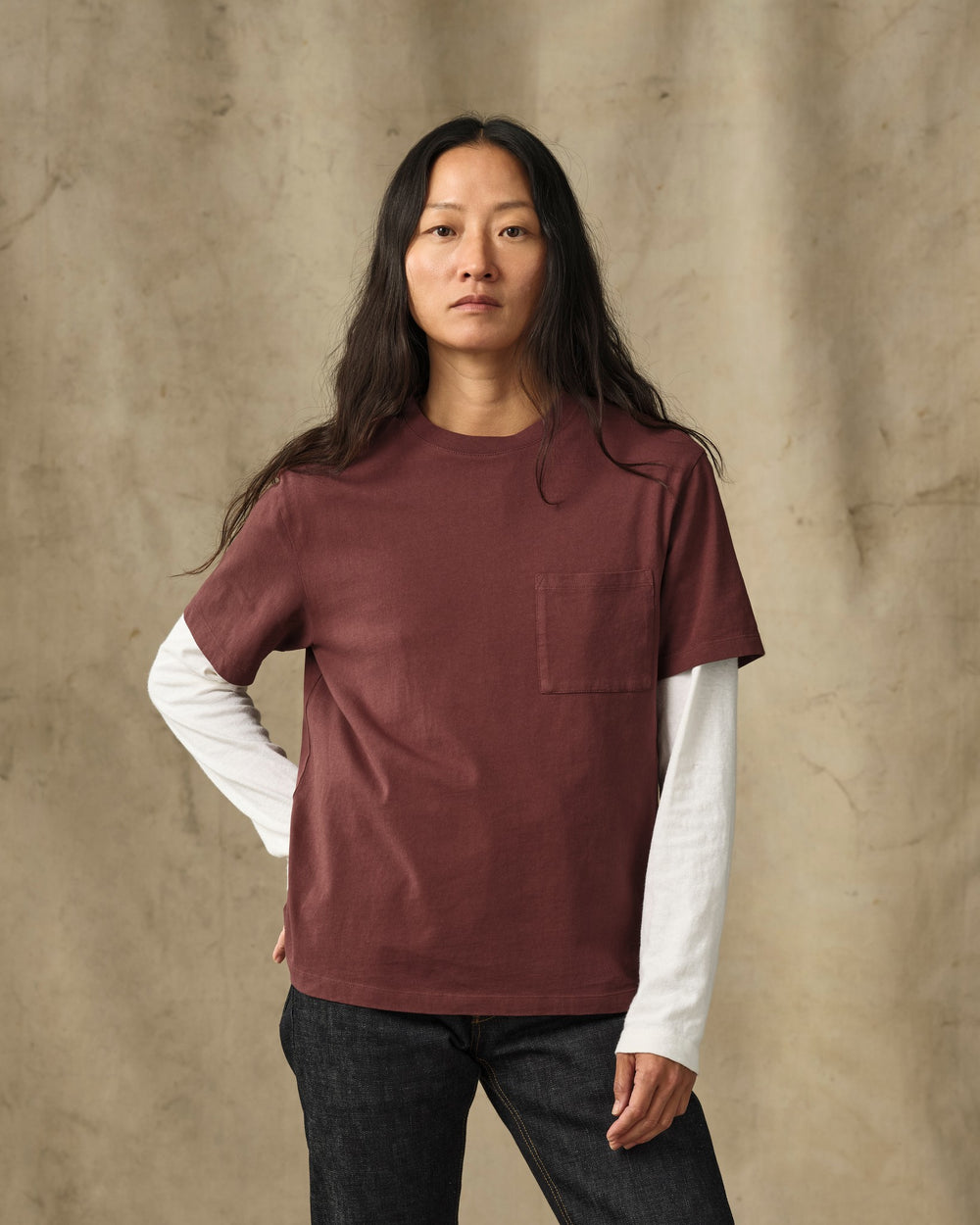 image of a model wearing Filson's Women's Short Sleeve Pocket Tee - Loam Brown
