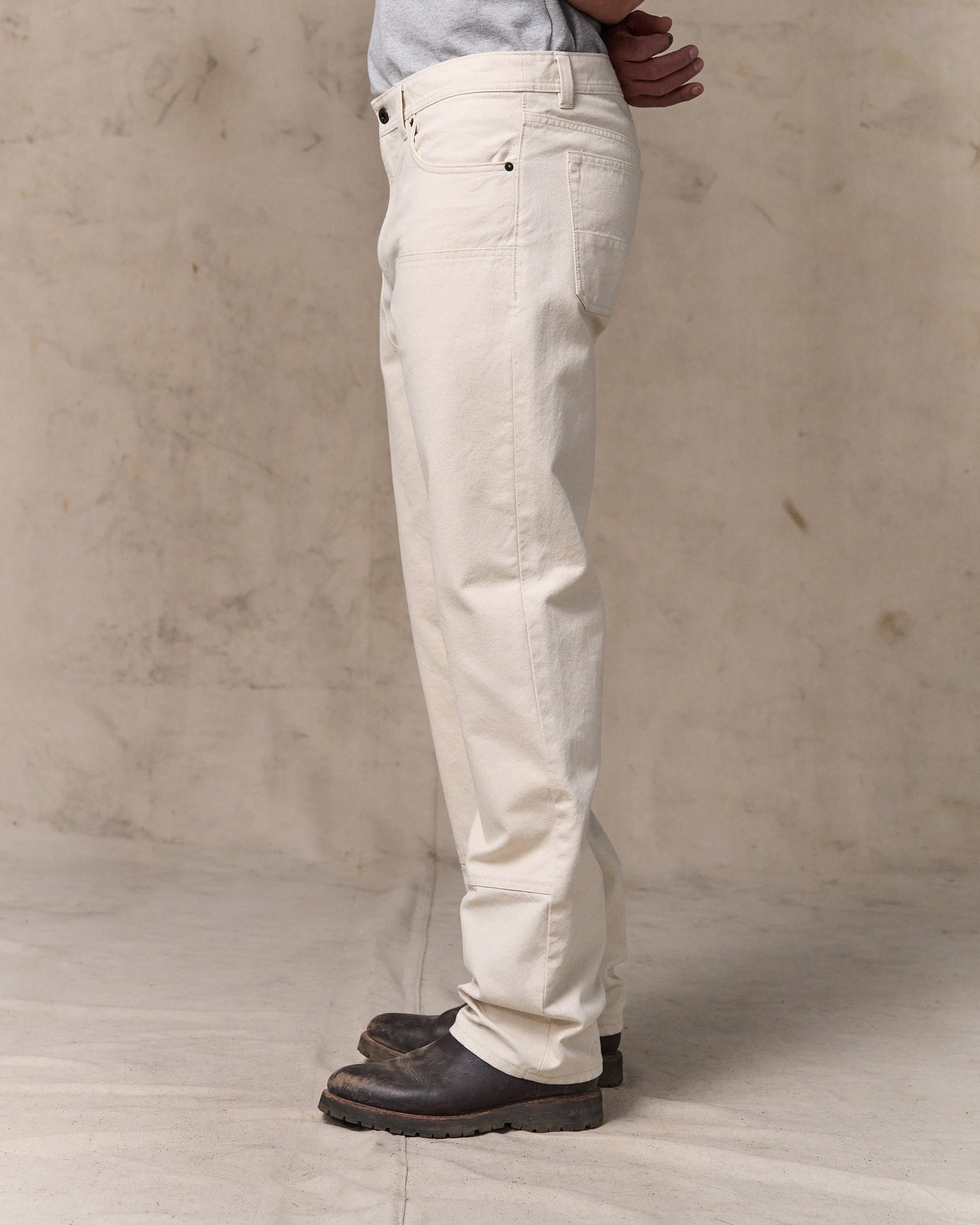 image of a model wearing Filson's Dry Tin Double Front Pants - Natural Seed