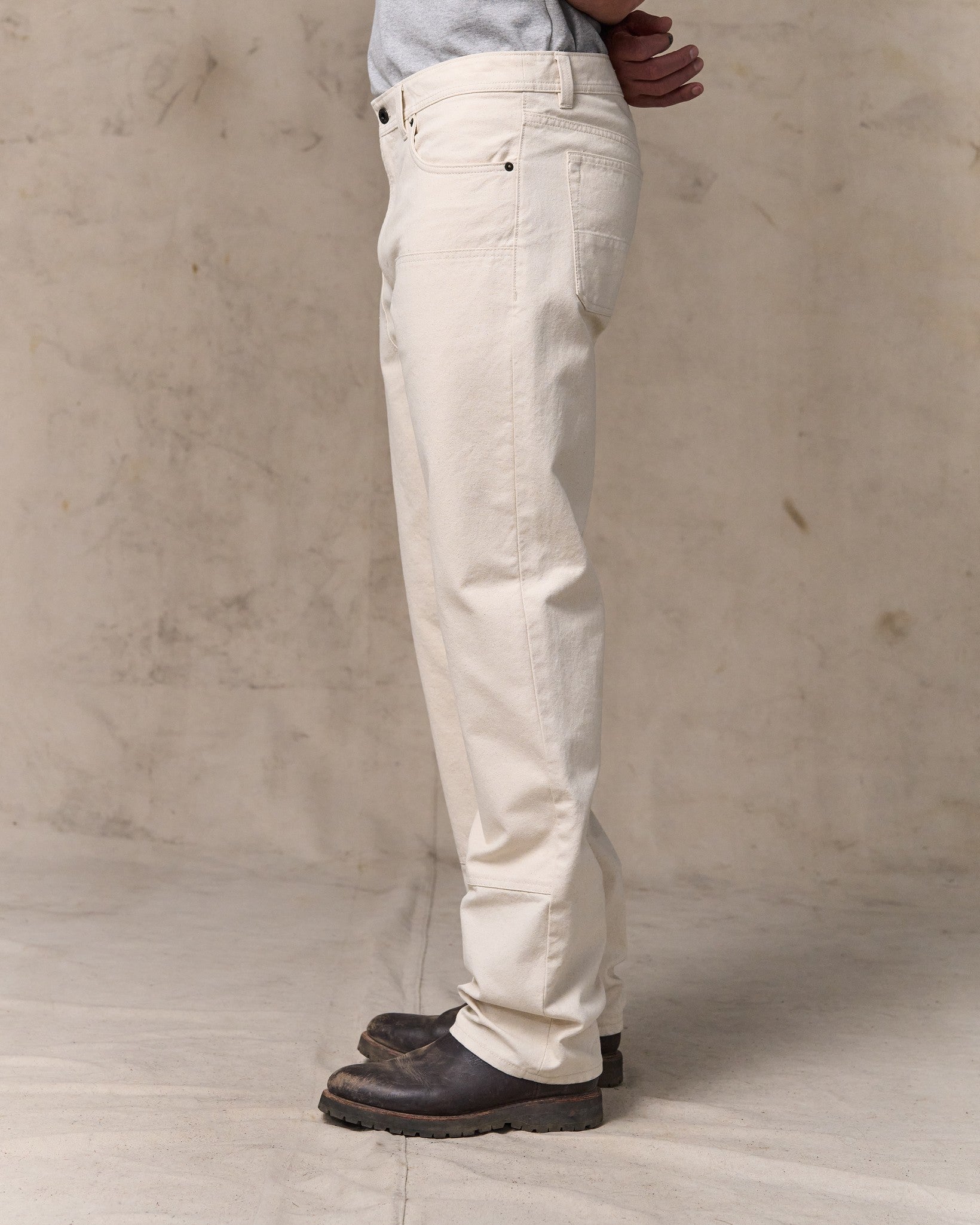 image of a model wearing Filson's Dry Tin Double Front Pants - Natural Seed