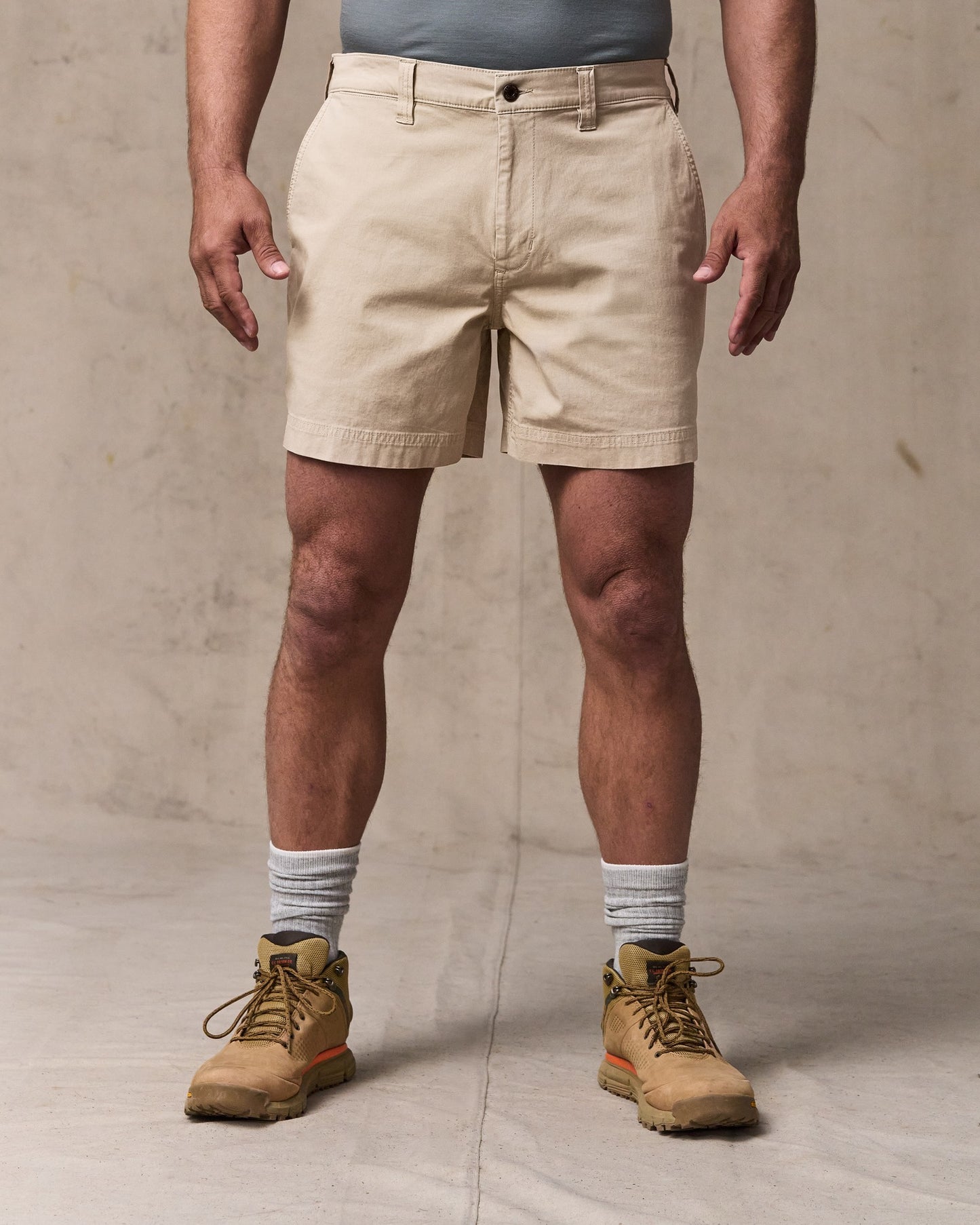 image of a model wearing Filson's Granite Mountain 6" Shorts - Buck Tan|Model is 6'1" wearing a size 34"