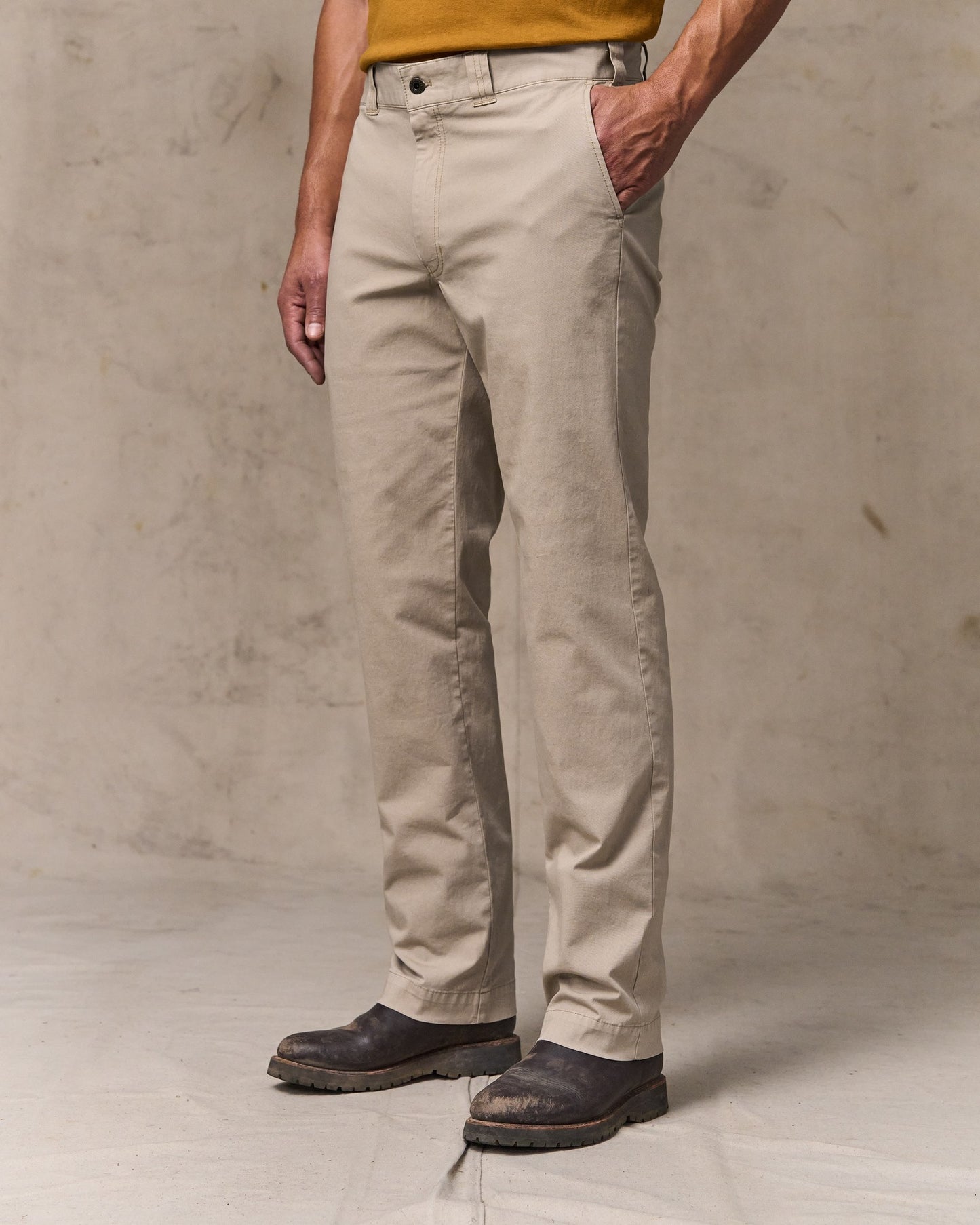 image of a model wearing Filson's Granite Mountain Flat Front Pants - Buck Tan