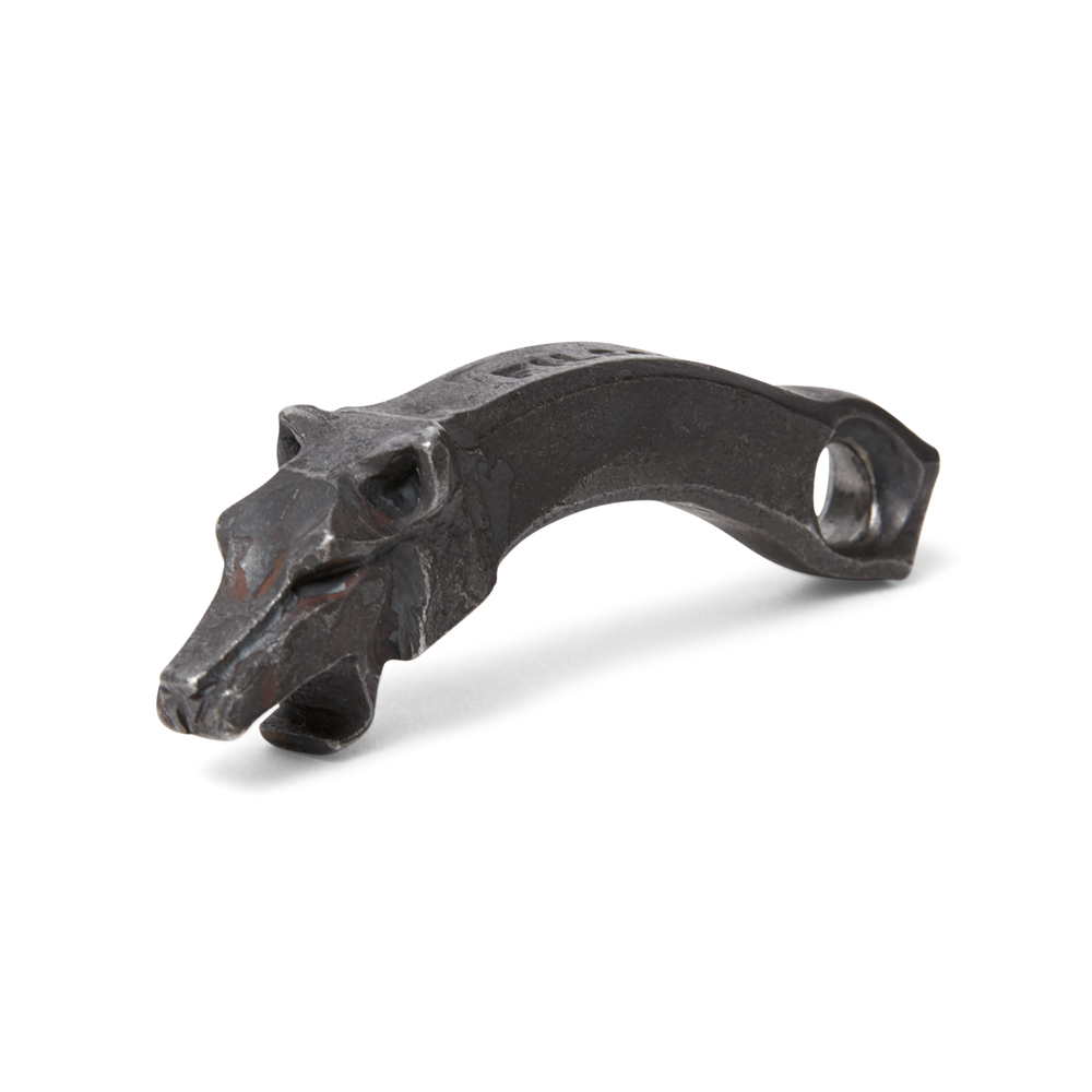 Front-facing image of the Filson Howling Wolf Bottle Opener - Steel