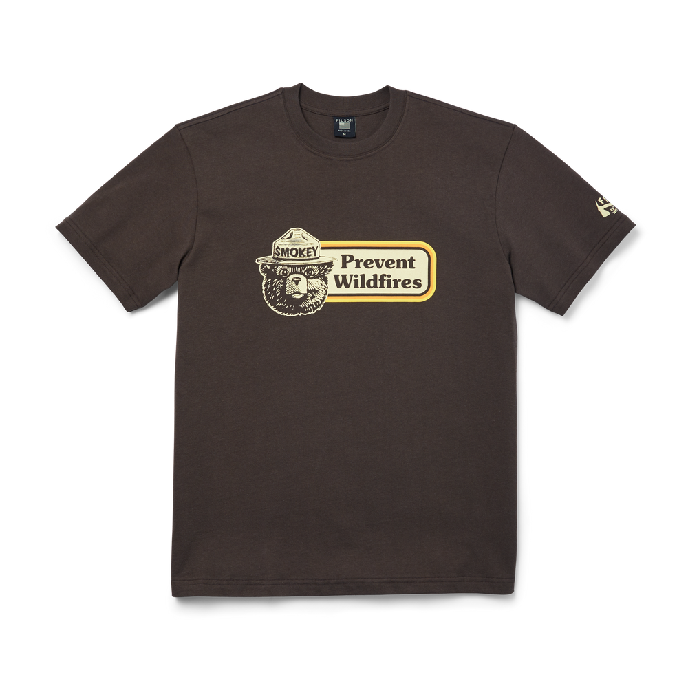 Front-facing image of the Filson Smokey Bear Pioneer T-shirt - Brown / Prevent Wildfire Sign