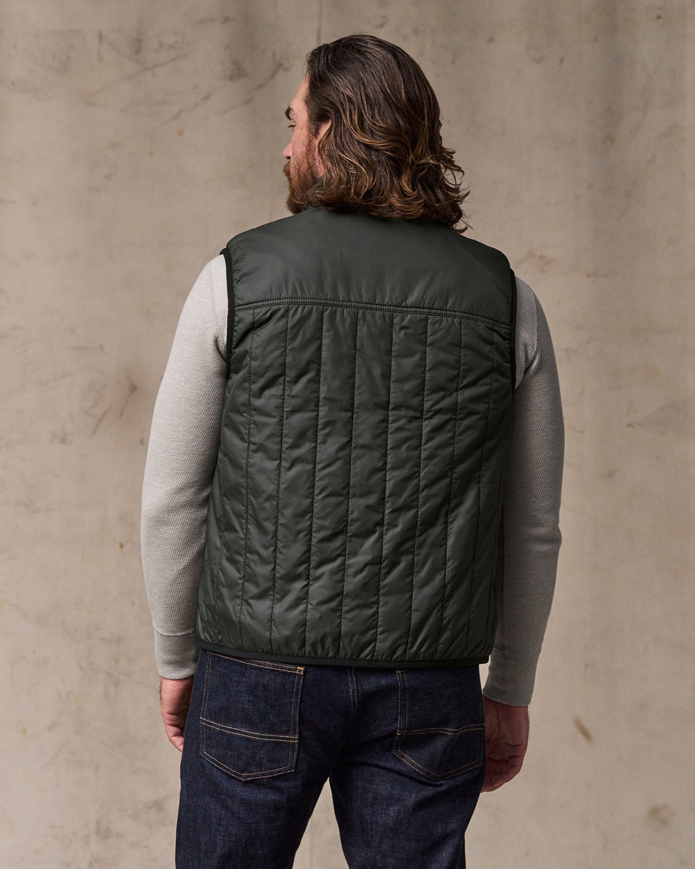 image of a model wearing Filson's Ultralight Vest - Raven