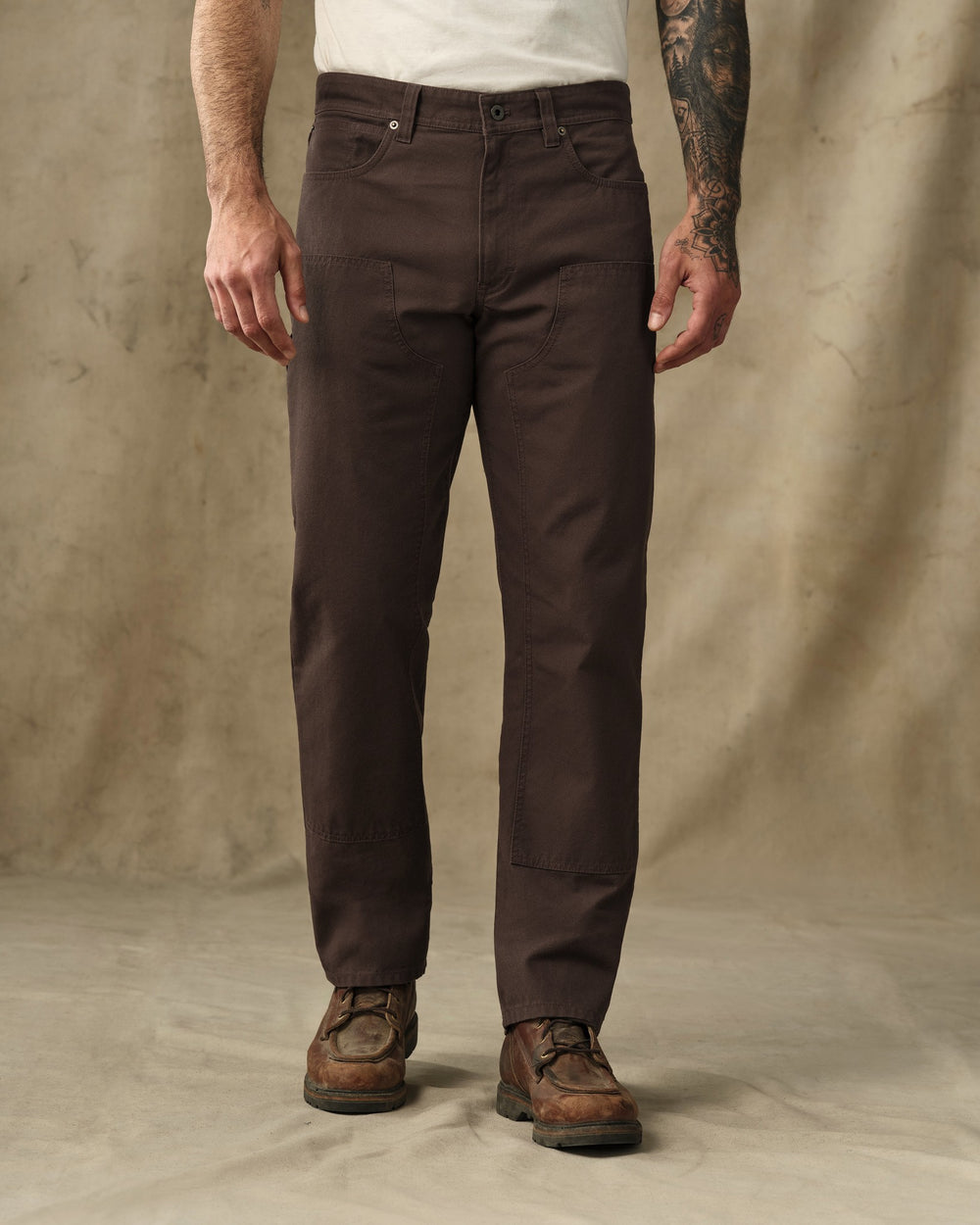 image of a model wearing Filson's Dry Tin Double Front Pants - Seal Brown
