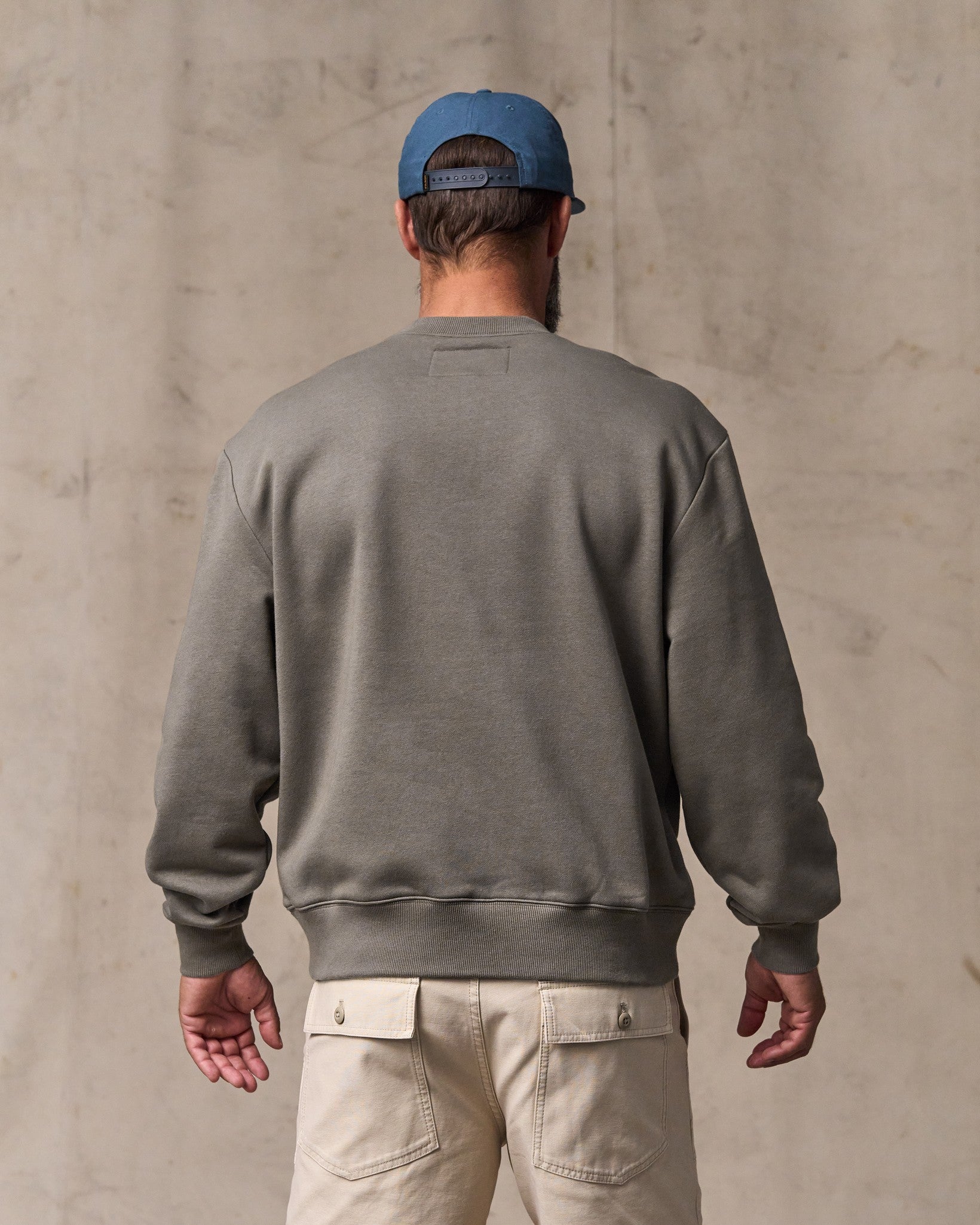 image of a model wearing Filson's Northwest Crewneck Sweatshirt - Hawk Brown