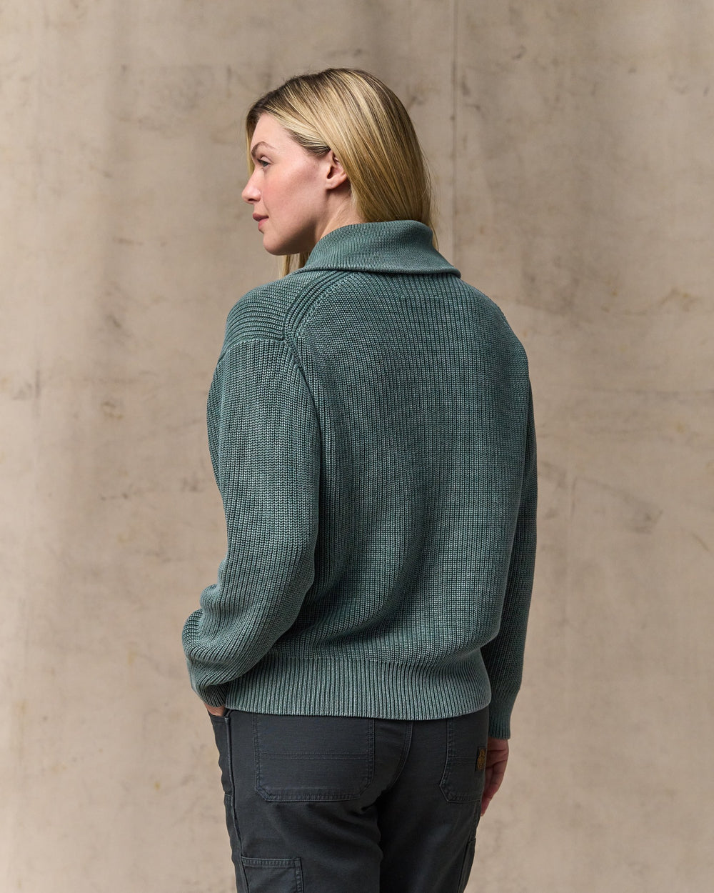 image of a model wearing Filson's Women's Cotton Shawl Neck Cardigan - Juniper