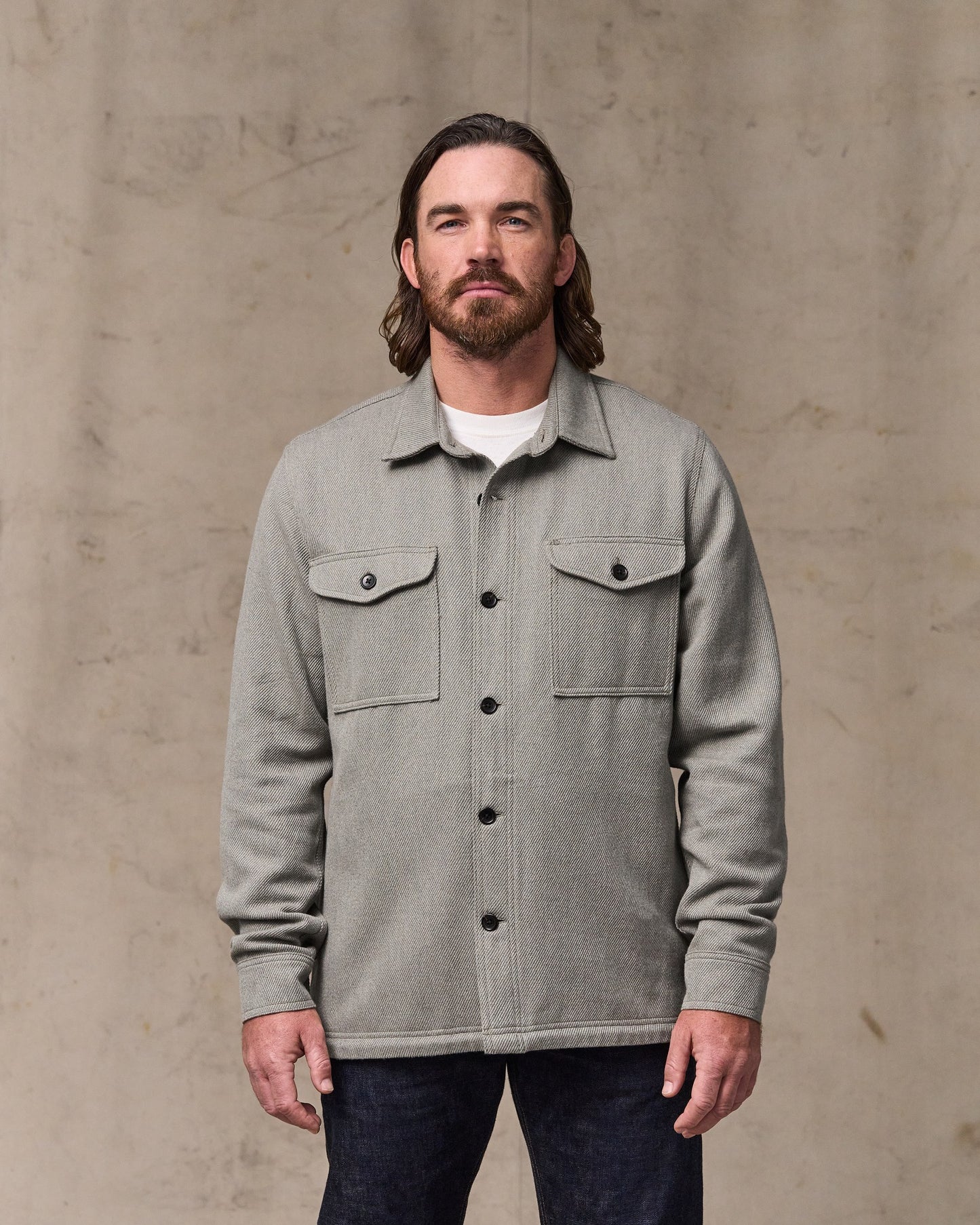 image of a model wearing Filson's Deer Island Jac-shirt - Heather Natural|Model is 6'1" wearing a size medium