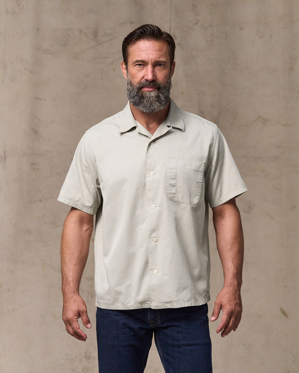 image of a model wearing Filson's Short Sleeve 4.5-oz. Twill Shirt - Ivory