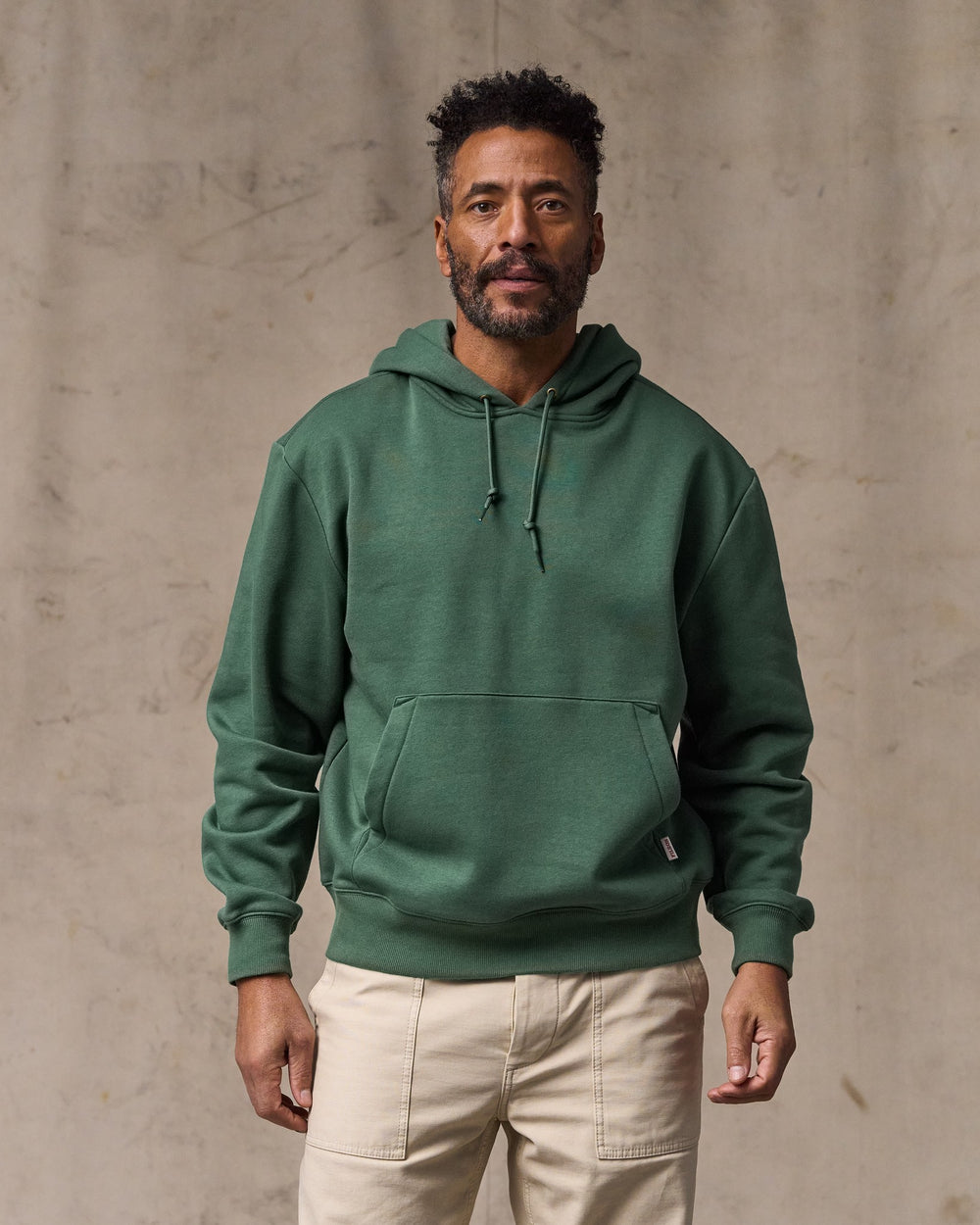 image of a model wearing Filson's Northwest Hoodie - Granite Green