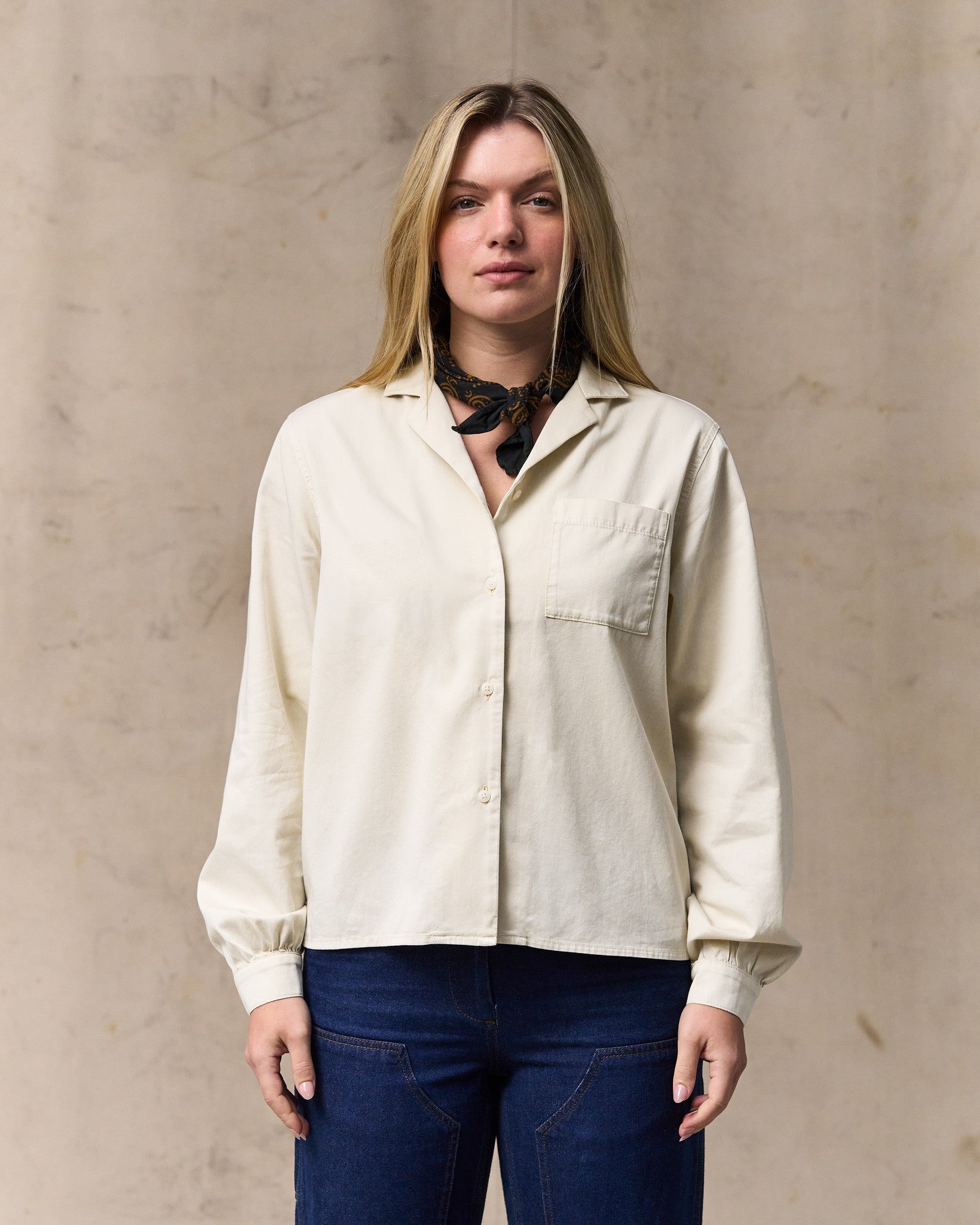 image of a model wearing Filson's Women's Long Sleeve Twill Camp Shirt - Cream