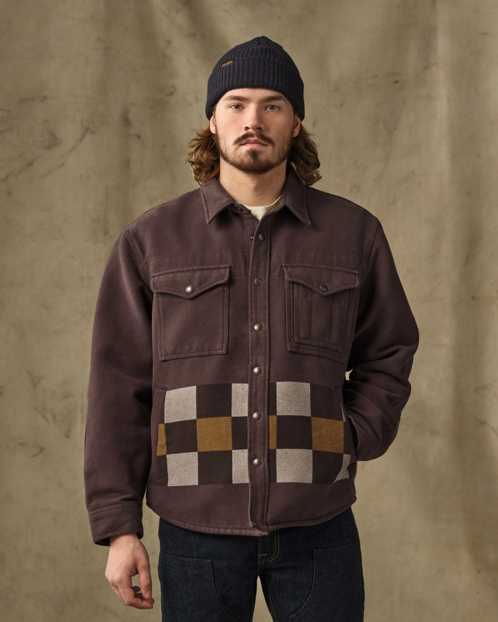 image of a model wearing Filson's Beartooth Jac-Shirt - Mahogany Geo Stripe