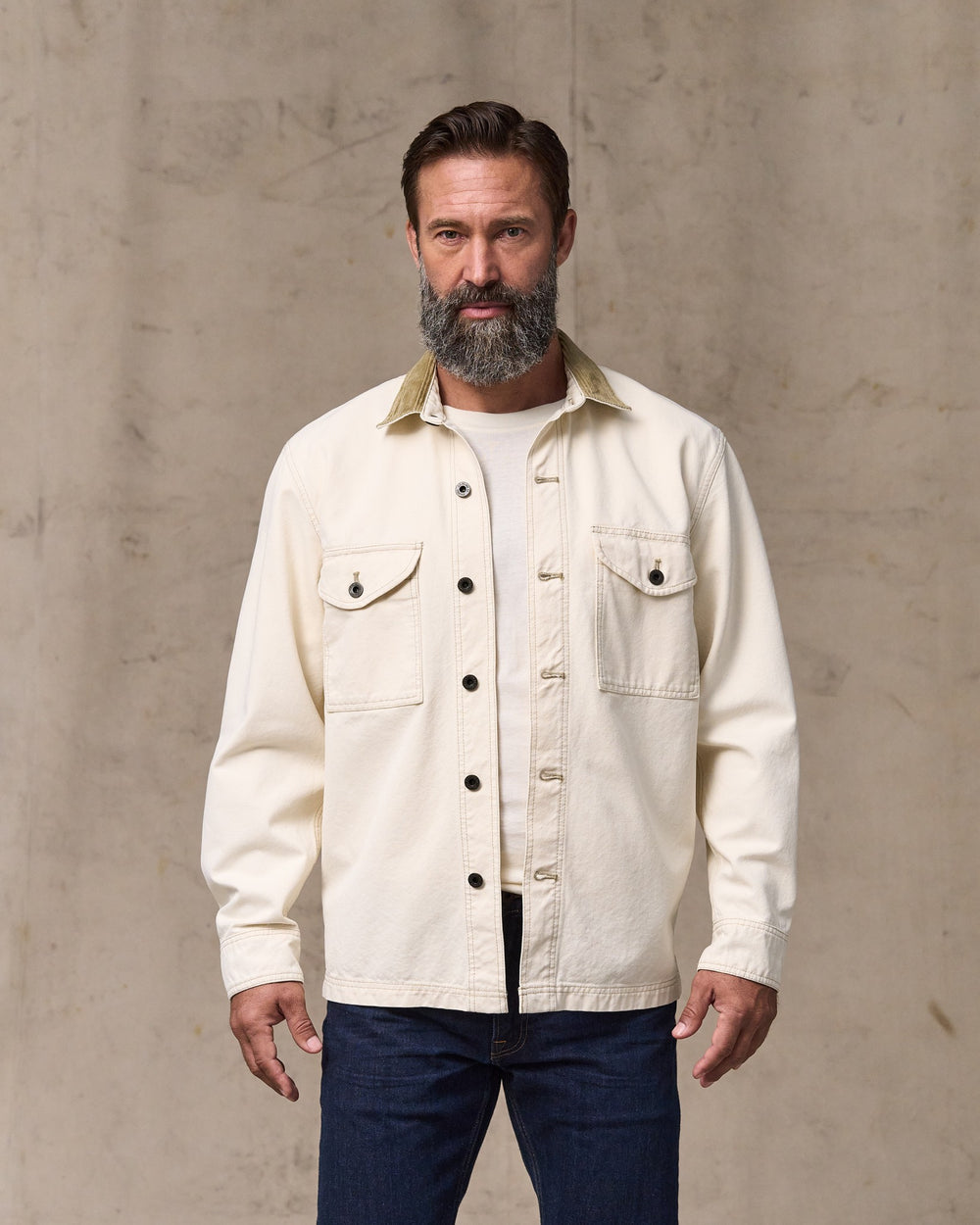 image of a model wearing Filson's Rustic Canvas Jac-shirt - Natural Seed