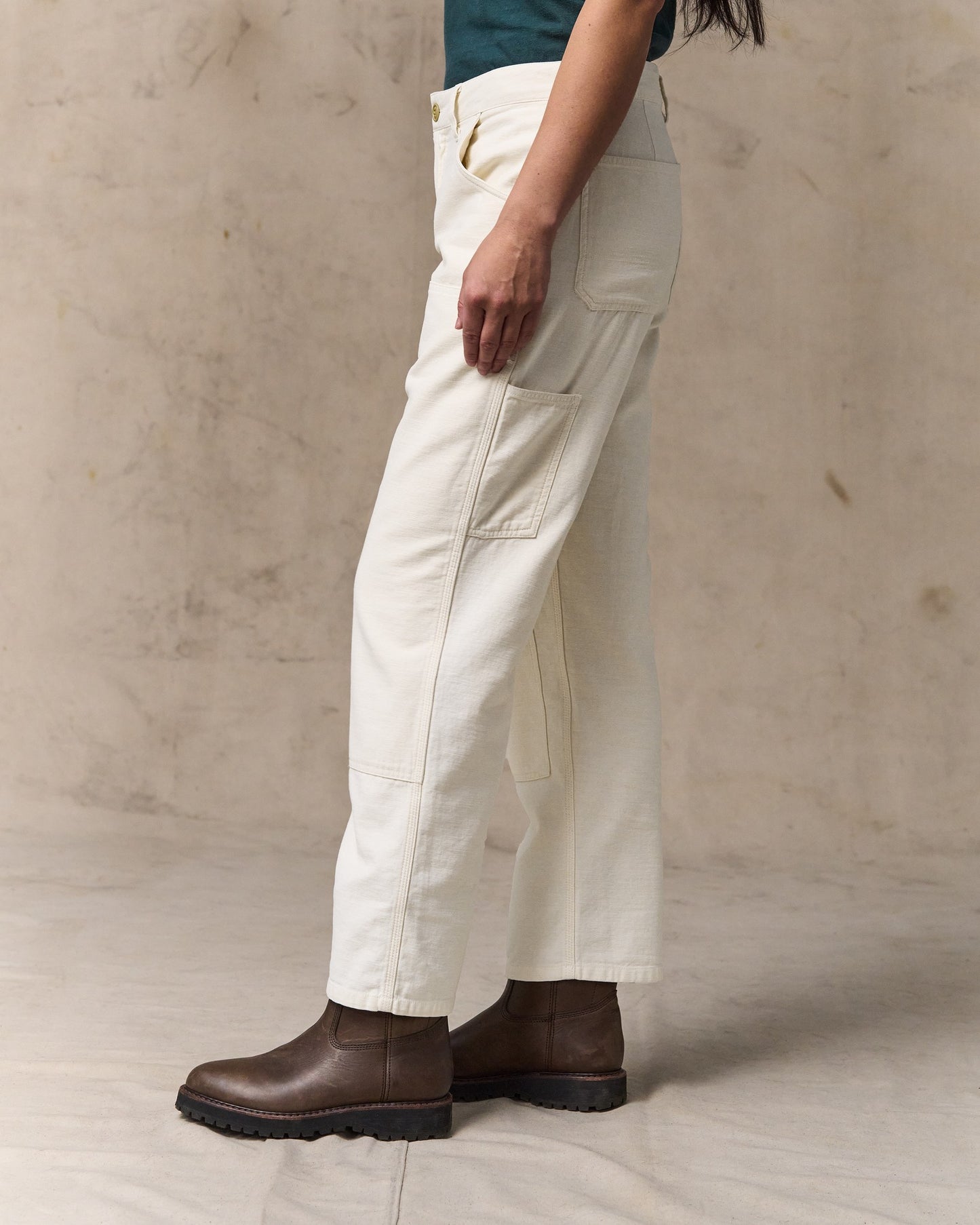 image of a model wearing Filson's Women's Reverse Sateen Double Front Pants - Natural Seed