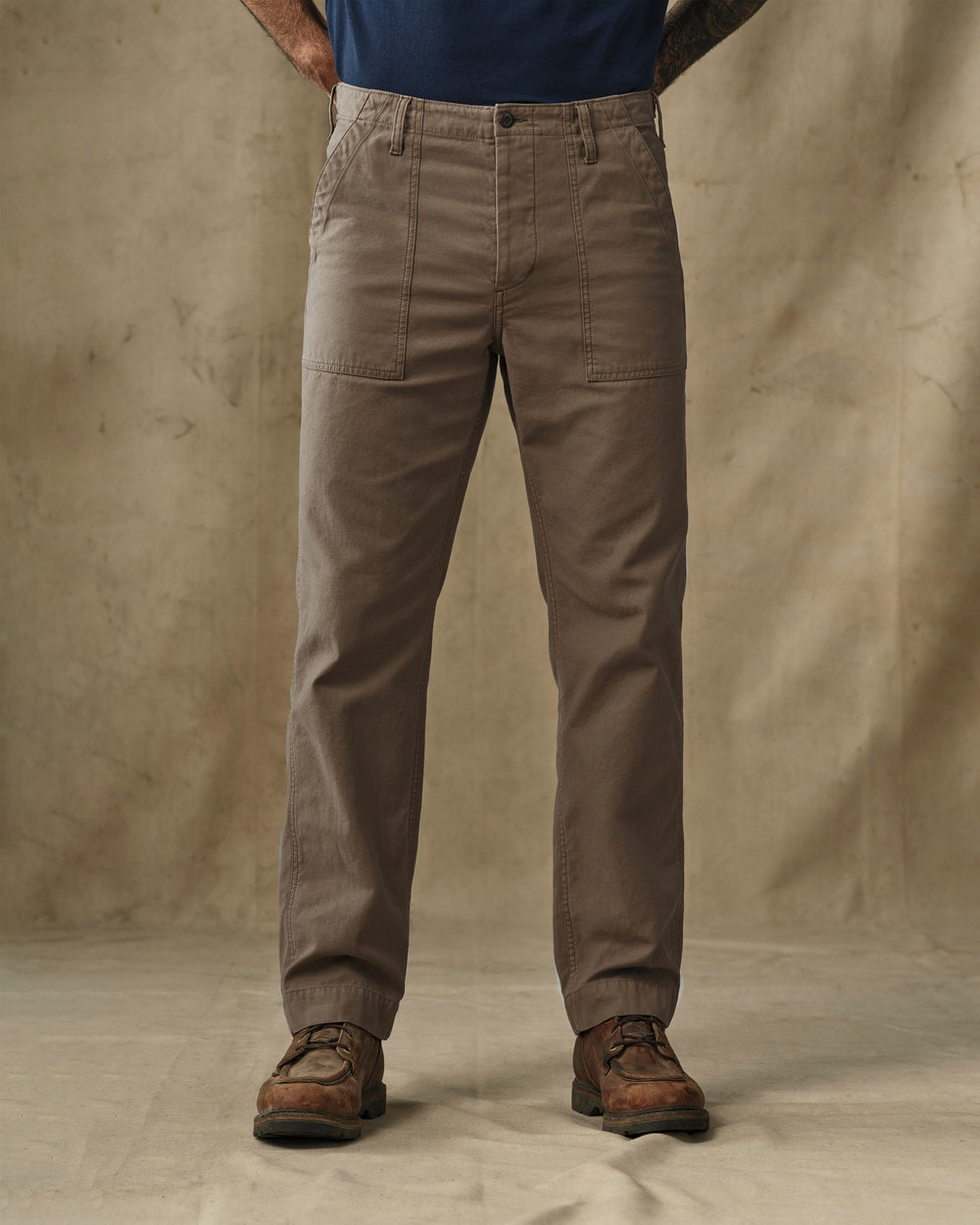 image of a model wearing Filson's Field Supply Pants - Teak