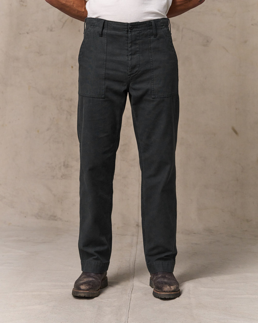 image of a model wearing Filson's Field Supply Pants - Washed Faded Black
