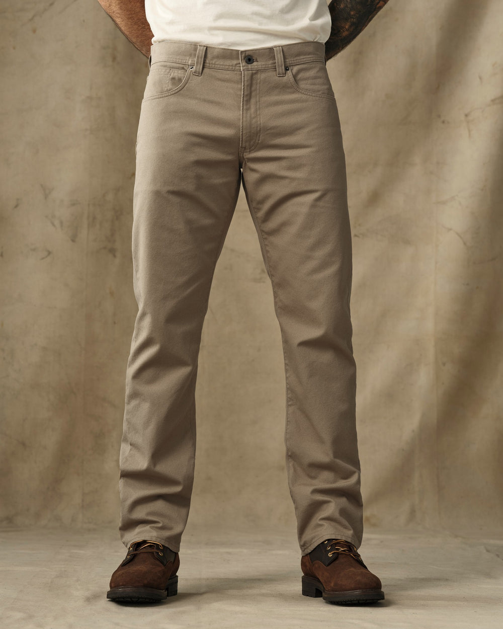 image of a model wearing Filson's Dry Tin Cloth 5-Pocket Pants - Khaki