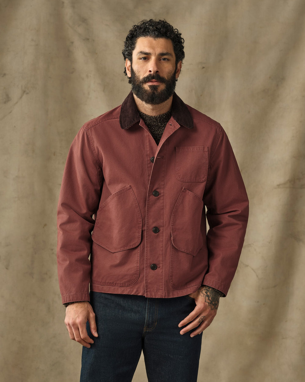 image of a model wearing Filson's Canvas Outfitter Jacket - Sequoia