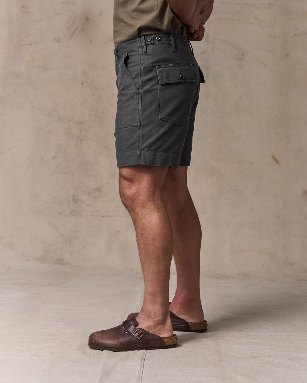 image of a model wearing Filson's Field Supply Shorts - Washed Faded Black