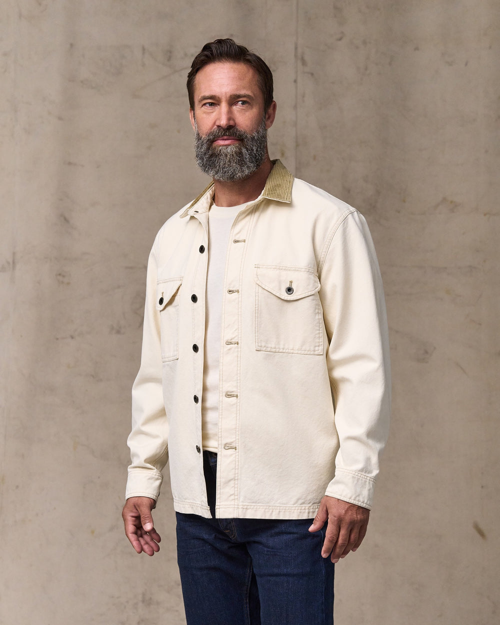 image of a model wearing Filson's Rustic Canvas Jac-shirt - Natural Seed