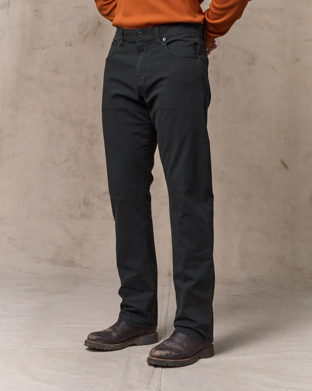 image of a model wearing Filson's Granite Mountain 5-pocket Pants - Washed Faded Black