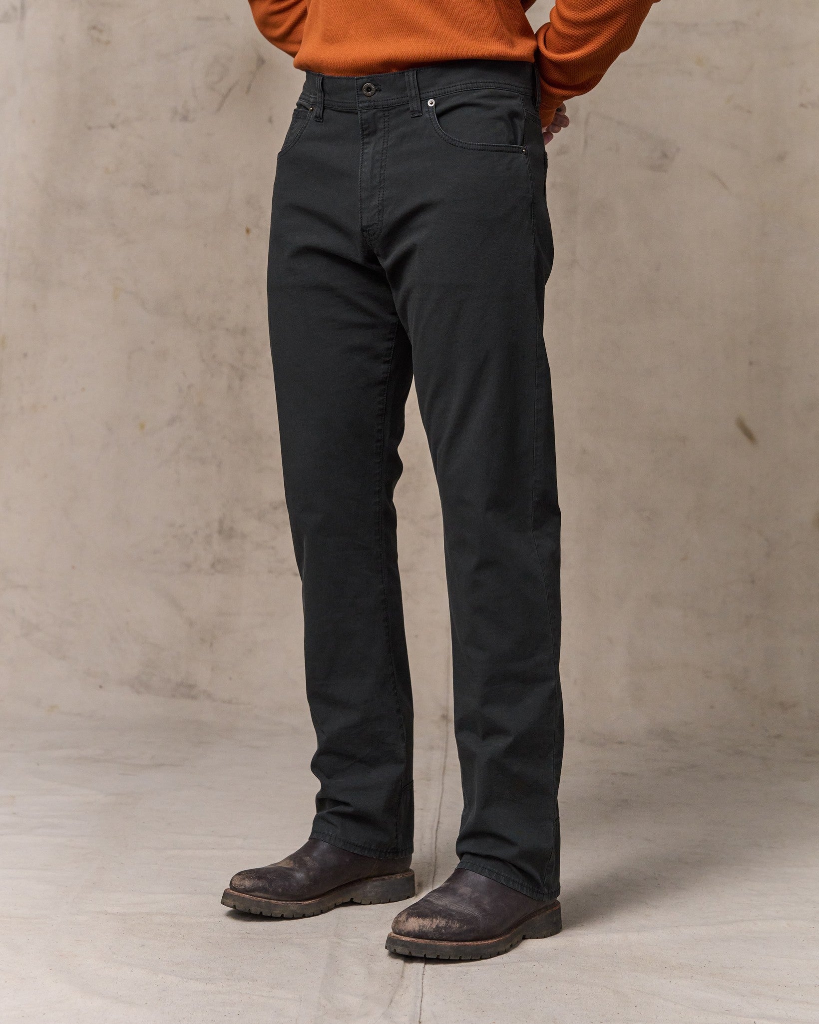 image of a model wearing Filson's Granite Mountain 5-pocket Pants - Washed Faded Black