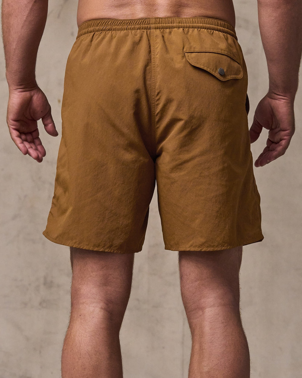 image of a model wearing Filson's Oxbow Lake Trunks - Whiskey