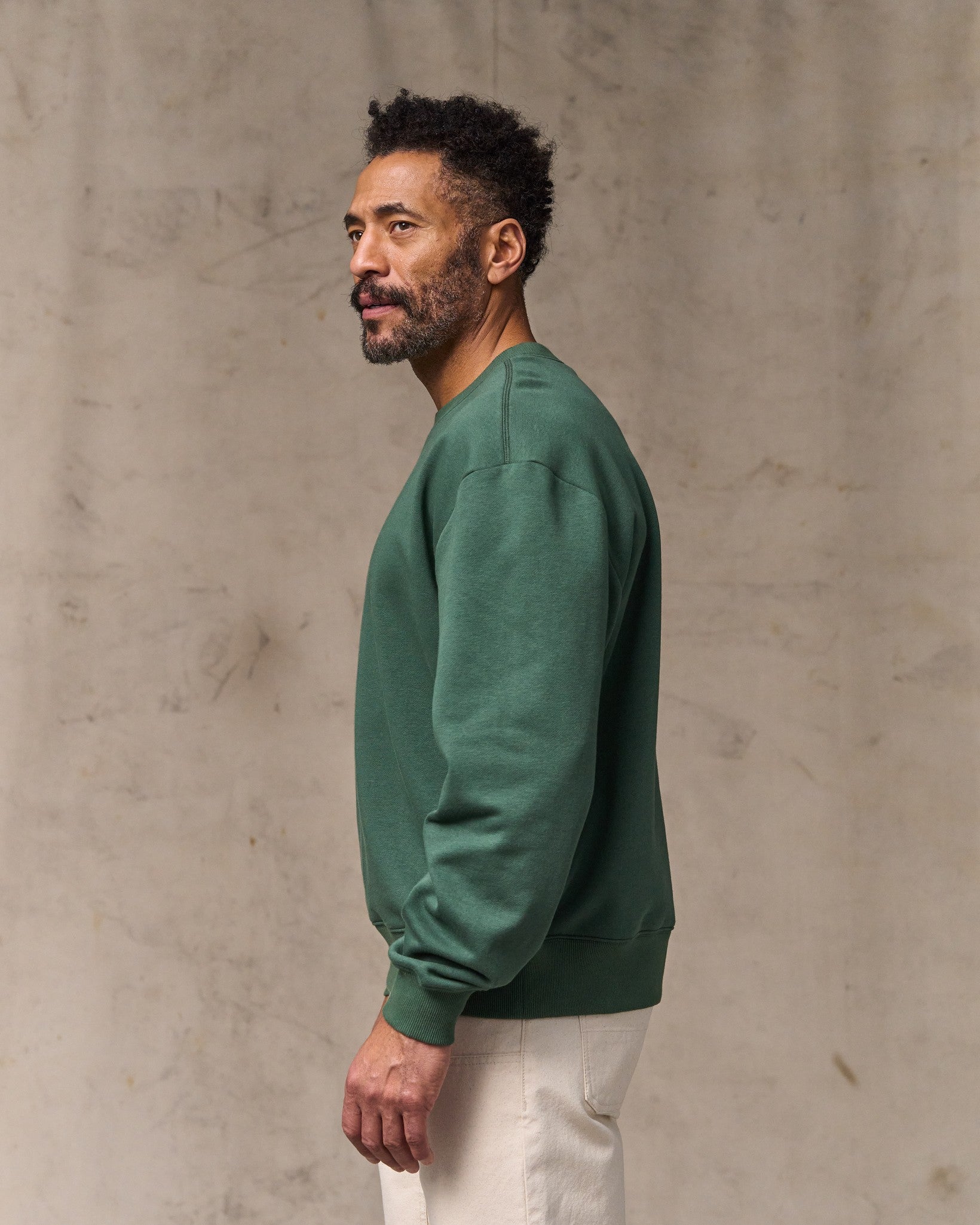 image of a model wearing Filson's Northwest Crewneck Sweatshirt - Granite Green