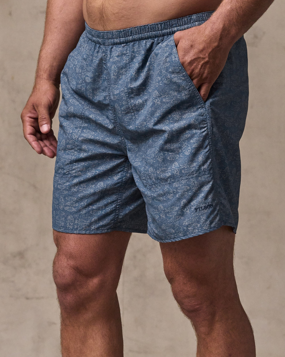 image of a model wearing Filson's Oxbow Lake Trunks - Blue / Print