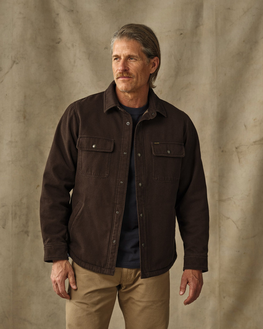 image of a model wearing Filson's Fleece Lined Jac-Shirt - Dark Brown
