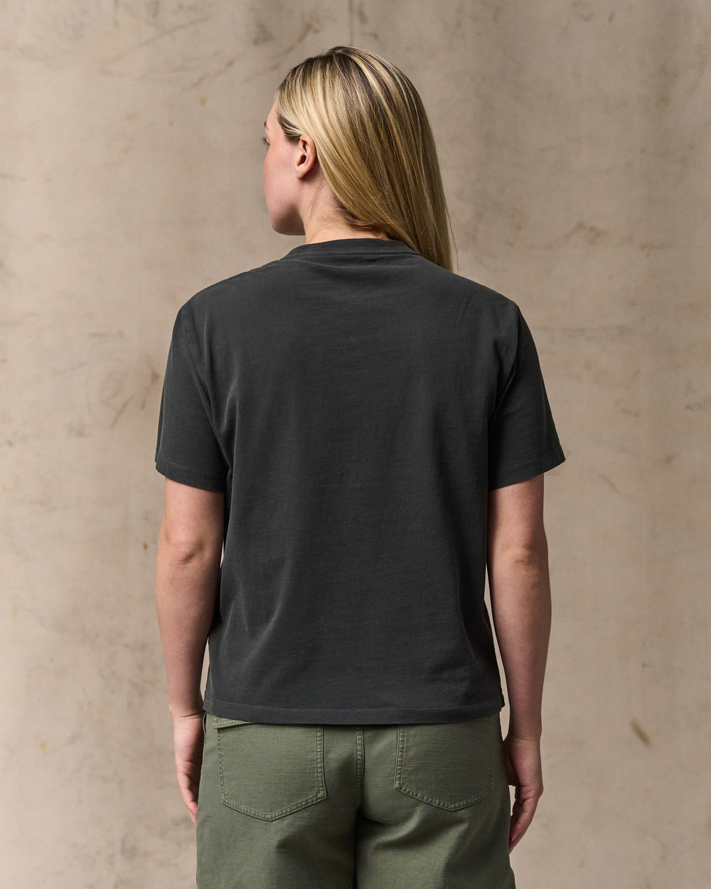 image of a model wearing Filson's Women's Short Sleeve Pocket Tee - Faded Black