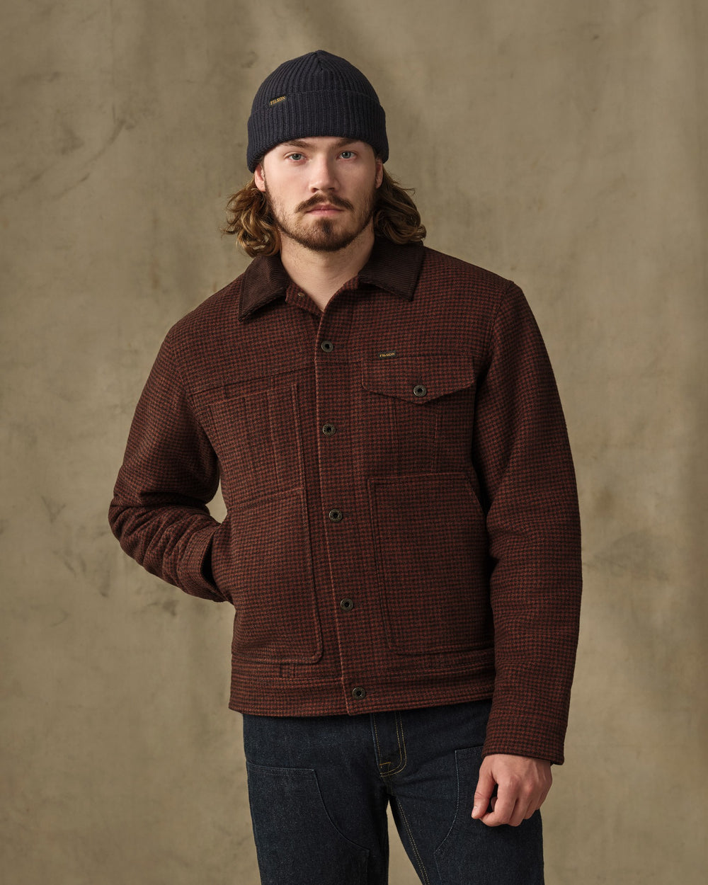 image of a model wearing Filson's Spokane Insulated Short Cruiser - Merlot / Black Plaid