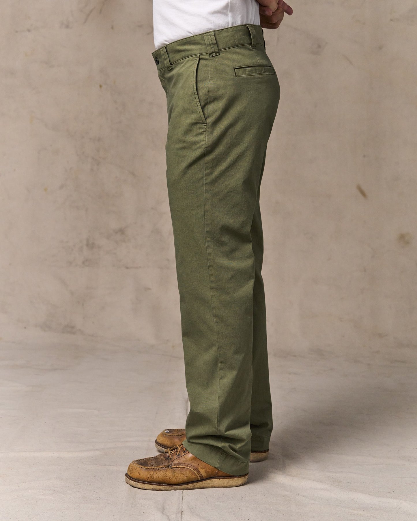 image of a model wearing Filson's Granite Mountain Flat Front Pants - Burnt Olive
