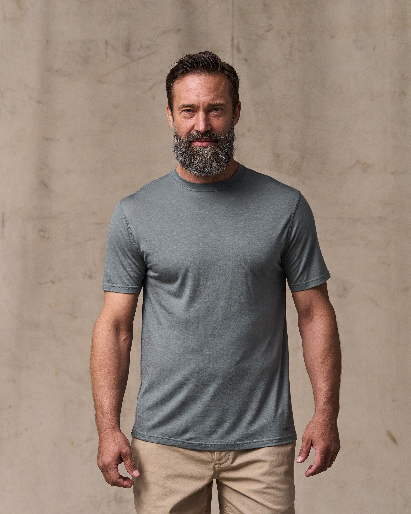 image of a model wearing Filson's Wool-blend Upf T-shirt - Sage Gray